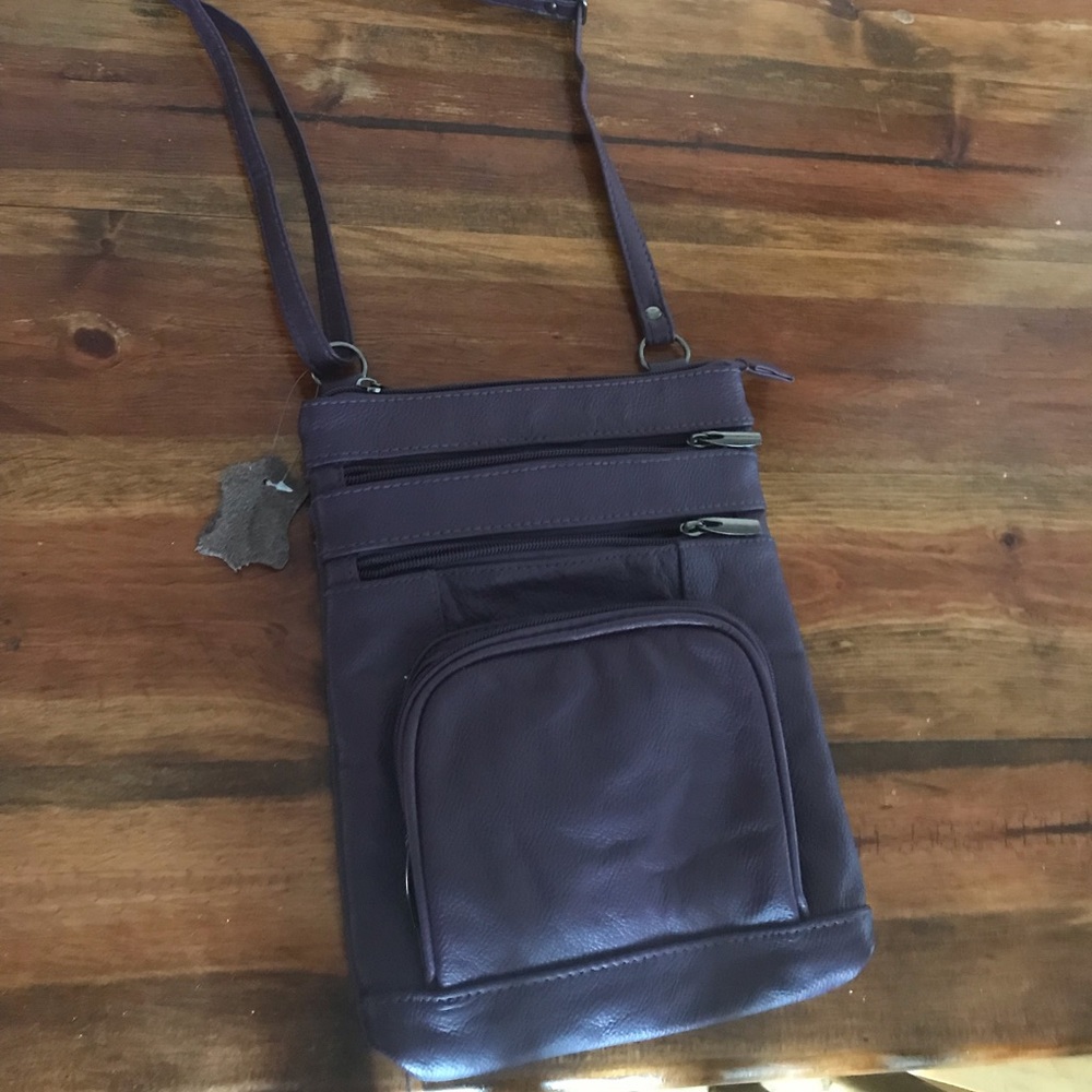 Purple cross over leather bag